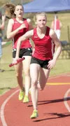 ROBERT DeBERRY/Frontiersman Wasilla freshman Morgan Dompier
starts her leg of the 1600-meter sprint medley relay Saturday at
the Palmer Relays.