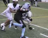 JEREMIAH BARTZ/Frontiersman Colony’s Ken McCoy knocks Chugiak’s
Justin Schneider out of bounds during a game against the Mustangs
early in the year.