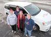 MyHouse’s Alice Renfro, Michelle Overstreet and Deborah Waisanen (far right) stand with Wasilla Rotarian Teresa Blume in front of the new MyHouse van. ROBERT DeBERRY/Frontiersman.com