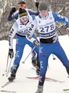 Palmer’s David Banse chases teammate James Lynn up a hill during Day 2 of the ASAA/First National Bank Alaska State Nordic Skiing Championships on Friday at Kincaid Park in Anchorage. Photo b