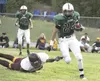 JEREMIAH BARTZ/Frontiersman Colony junior Wyatt Peltier runs for
a gain during a loss to Dimond last week.