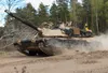 U.S. Soldiers assigned to 1st Battalion, 68th Armor Regiment, 3rd Armored Brigade Combat Team, 4th Infantry Division conduct a platoon situational training exercise at Bucierz Range, Drawsko 
