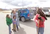 ROBERT DeBERRY/Frontiersman Members of the Livingston family
check out a rough-legged hawk during Saturday’s Celebration of
Cranes at the Palmer Museum and Visitor Center. Volunteers from the
