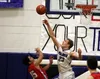 Palmer senior Clayton Southwick reaches for a loose ball duing a win over Anchorage Christian School Jan. 19, 2018, at Palmer High School. Courtesy of Bruce Eggleston/matsusports.net