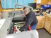 Latitude 67 Laser Designs owner Gale Glenn demonstrates how she creates custom creations with her laser cutter insider her shop. Jacob Mann/Frontiersman