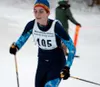 Colony's Kate Fitzgerald ski toward the finish line during the
Holmenkol Mat-Su Pursuit classic cross-country ski race on the
Colony High School ski trails on Friday. Photo by JEREMIAH BARTZ/