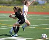 West Valley midfielder Riley Baumgartner collides with Colony's Mykie McMullen during West Valley's 7-0 win over the Knights in the quarterfinal round of the ASAA/First National Bank State So