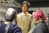 Mary Martushev, left, and Karen Lackey work on Nicholas Carlson's costume for his character, Stephen Irving, in Valley Performing Arts' production of 'Anne of Avonlea' during Tuesday's rehear