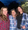 Kristin Cook, center, co-owner with her husband, Casey, of The Grape Tap in Wasilla, announced the restaurant will be closing at the end of December. She is flanked by employees Lisa Davis, l