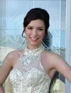 Emily Yannatone models the evening gown she wore while competing in the Miss Alaska Outstanding Teen competition June 5 at the Wendy Williamson Auditorium in Anchorage. Yannatone, the only Va