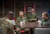 U.S. Air Force Col. Otis C. Jones, 374th Airlift Wing commander, left, Japanese Ground Self-Defense Forces Maj. Gen. Shigeo Kaida, 1st Airborne Brigade commander, center, and U.S. Air Force C