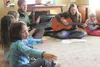 Students in Louise’s Farm School sing ‘Itsy Bitsy Spider’ while waiting for a pot of pumpkin soup to cool during a National Food Day celebration Oct. 23. HEATHER A. RESZ/Frontiersman
