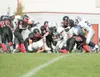 ROBERT DeBERRY/Frontiersman The Houston Hawk defense stops the
Soldotna Stars at the line of scrimage during the fourth quarter of
Saturday’s game at Houston High School.