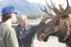 MATT TUNSETH/Frontiersman Alaska Department of Fish and Game
wildlife technician Nick Cassara, left, fields a question from
Palmer hunter Jesus Jazo Saturday during a seminar designed to
fami