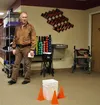 Wasilla Area Senior Center CEO Chuck Foster checks on an area of the facility during the week that followed the Nov. 30 earthquake. Jacob Mann/Frontiersman