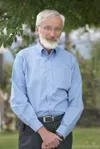 Alex Hillis estimates he’s traveled more than 1 million miles
attending to educational pursuits around the globe over the past
decade. ROBERT DeBERRY/Frontiersman