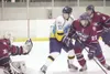 ROBERT DeBERRY/Frontiersman Alaska Avalanche forward Blake
Huppert watches as a shot on goal is stopped by Fairbanks goalie
Jake Williams Friday in Wasilla.
