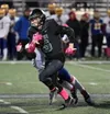 Colony's Bryce Guzman runs for a gain during a playoff loss to Bartlett. Bruce Eggleston/matsusports.net
