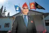 American Legion National Commander Fang Wong stands in front of Legion Post 15 in Palmer. Wong is in the Valley for the statewide convention. The site of the convention rotates annually, land