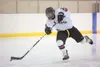 Houston junior forward Cody lipse takes a shot on goal during a game against the Glennallen Panthers at the Curtis C. Menard II Memorial Ice Arena in Wasilla. Robert DeBerry