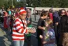 Houston Mayor Virgie Thompson hands out eggs for the annual Egg Toss dressed as Waldo from the “Where’s Waldo?” book series. Jacob Mann/Frontiersman