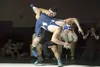 Wasilla's Quace Wright and Palmer's Ben Button wrestle in a match at Wasilla High earlier this year. Wright and Button will meet in the 220-pound final of the ASAA/First National Bank 4A Stat