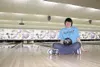 GREG JOHNSON/Frontiersman Steve Ehrhart, 16, sits in front of
lucky lanes 17 and 18 at North Bowl in Wasilla with the ball he
bowled a perfect 300 game with Friday in the first round of the
U