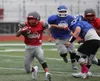 Wasilla senior Jordan Quenga runs for a gain during a scrimmage against Palmer earlier this month. Jeremiah Bartz/Frontiersman