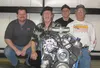 Erik Johnson, Midnight Sun Street Rod Association past president; Mike Lassley, winner of a 350 Chevy engine; Neil Noll, club resident; and KB Bettisworth, Engine Project chair for the effort