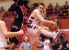 Wasilla junior Dillon Ferro passes the ball during Wasilla’s
game against the Banning Pilots Wednesday evening at the Doc
Larson’s Roundball Classic at Wasilla High School. (ROBERT
DeBERRY/Fr