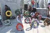 Wreaths are placed during Memorial Day ceremonies at the Alaska Veterans Memorial near Byers Lake on May 26. — Courtesy Perry Streeter Courtesy Perry Streeter