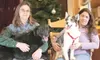 ROBERT DeBERRY/Frontiersman Jeffery Lisa Charvet, left, and
Jennifer Simmermeyer sit with their dogs Lucky, left, and Remmy.
Both Remi and Lucky have been caught in wildlife traps.
