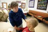 Mat-Su Services Adult Day Services site manager Peg Bowers talks with Jackie Jones Monday afternoon at the old Palmer Senior Center. The old senior center is being used temporarily for adult 
