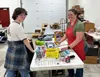 Volunteers with Alaska Family Services’ Special Santa program sort donated gifts in preparation for Christmas delivery. Photo courtesy of Alaska Family Services