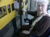 Jessie De Vries had a crack system for opening doors when she
rode in hand-powered wheelchairs. While it takes less energy to use
the motorized version, now she needs more help with entrances