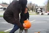 A local girl picks out a pumpkin at the 2019 Pumpkin Patch Coat Drive hosted by Primelending. Frontiersman file photo.