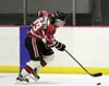 Houston sophomore Reed Humphreys skates the puck up the ice during a 6-0 win over Hutchison Jan. 29, 2016, at the Big Lake Recreation Center. Humphreys scored four goals in the win. Courtesy 