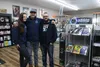 Aegis Comics of Alaska owners Lu and Amie Nieves pose for a photo with staff member Kevin Doggett. Jacob Mann/Frontiersman