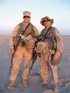 Isaac Moore, left, used his time in Iraq to build bridges and to
establish friendships. Wrestling became a powerful tool in that
effort. Submitted photo.