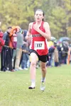 Houston freshman Allison VanPelt sprints to the finish with just one shoe in the girls' 123A race of the Region III Cross Country Running Championships at Colony High School on Saturday. Van 