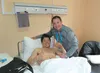 Palmer’s Andrew Kurka poses for a picture with Dr. Arthur DeLuigi of the United States Olympic committee while Kurka was hospitalized in Sochi, Russia. Kurka, an adaptive skier preparing to c