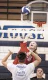 Palmer sophomore Mariah McNamara reaches for the ball during Monday’s volleyball practice at Palmer High School. ROBERT DeBERRY/Frontiersman.com