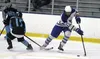 Palmer forward Owen Hayes powers past a defender during an 11-0 win over Hutchison Friday. Jeremiah Bartz/Frontiersman
