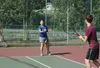 Mat-Su Tennis Association instructor Traci Sanders, also a science teacher at Colony High School, lofted a ball to Junior Tennis member Asheton Urbanski at the association's weekly class for 