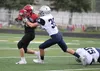 Houston running back Owen Mulhaney works to break a tackle during a loss to Eagle River Friday in Houston. Jeremiah Bartz/Frontiersman.com