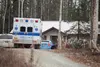 A Mat-Su Borough ambulance sits in the driveway at 2015 Krysten Circle, where one person was pronounced dead and four others transported to the hospital due to severe carbon monoxide poisonin