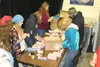Volunteers crammed MyHouse's storage room Thursday afternoon to help prepare Narcan kits. Several thousand kits were assembled and will soon be distributed throughout the Mat-Su. Narcan is us