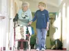 Margaret Carnes gets assistance walking back to her room at Knik Manor at the Wasilla Senior Center in this 2007 Frontiersman file photo. A WASI board decision to stop offering assisted-livin