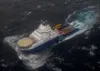 The tug Aiviq travels at just under 2 mph with the mobile drilling unit Kulluk in tow 116 miles southwest of Kodiak City, Alaska, Sunday, Dec. 30, 2012. The Aiviq is tandem towing the Kulluk 