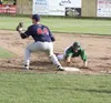 Mat-Su outfielder Cameron Frost slides back into first during a game against the Chugiak Chinooks June 11. On June 17, Frost finished 4 for 5 at the plate to help Mat-Su club Chugiak 13-2. Je